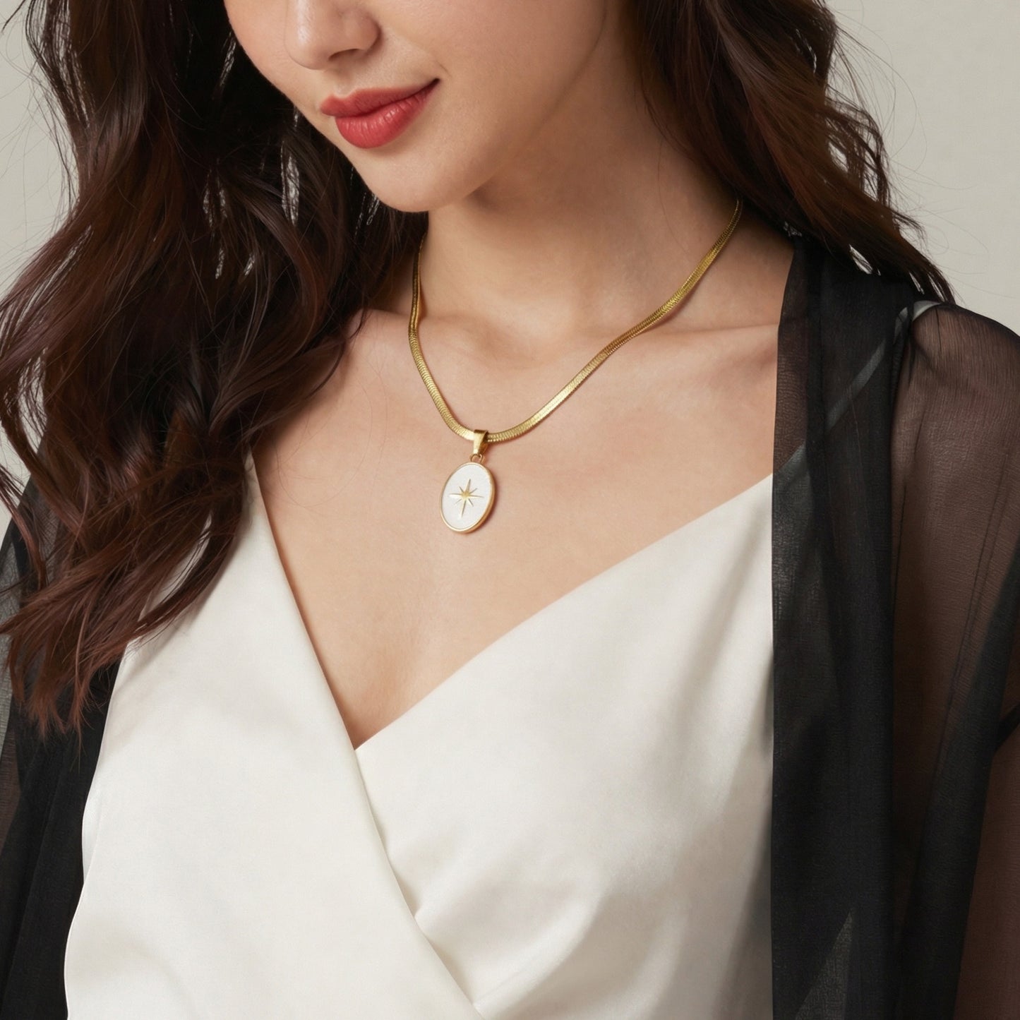 Oval eight-pointed star pendant